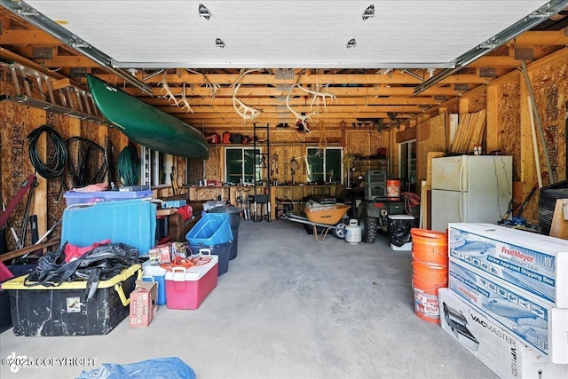 57541 Clam Diggers Ave, Clam Gulch, AK 99568 - garage with freestanding refrigerator