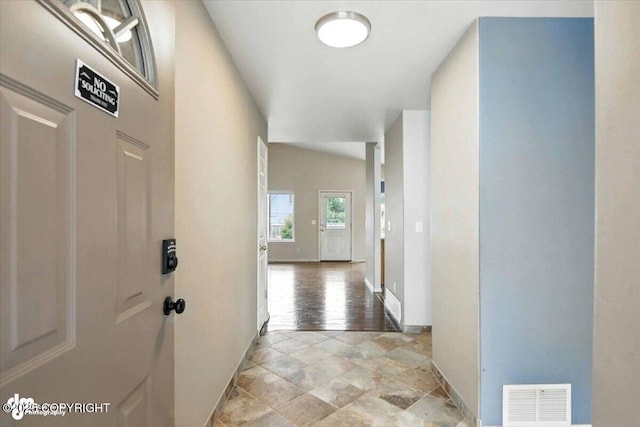 7851 Alpine View Cir, Anchorage, AK 99507 - hallway with baseboards and light stone finish flooring
