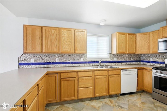 7851 Alpine View Cir, Anchorage, AK 99507 - kitchen with stainless steel appliances, decorative backsplash, stone finish floors, and light countertops