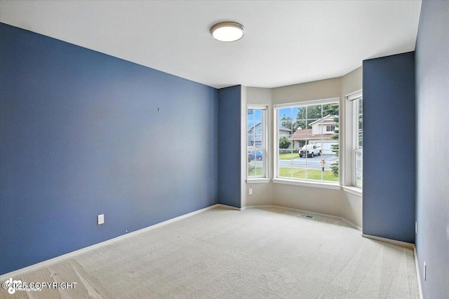 7851 Alpine View Cir, Anchorage, AK 99507 - carpeted empty room featuring baseboards