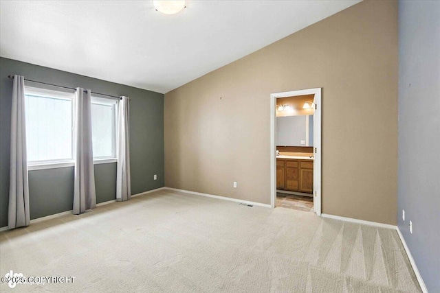 7851 Alpine View Cir, Anchorage, AK 99507 - spare room featuring lofted ceiling and light carpet