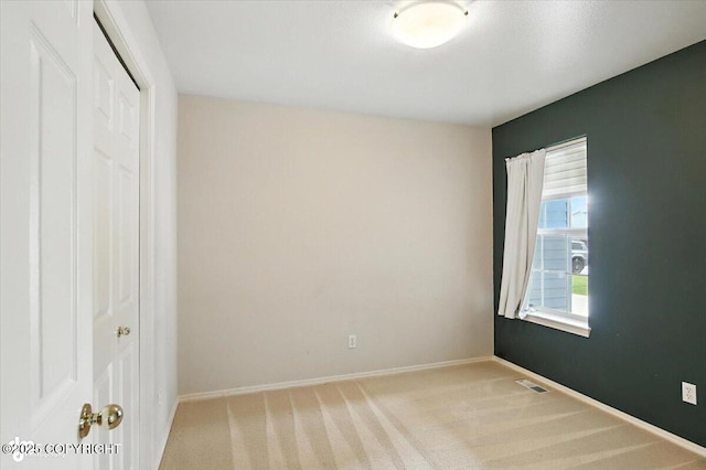 7851 Alpine View Cir, Anchorage, AK 99507 - unfurnished bedroom with light carpet and a closet