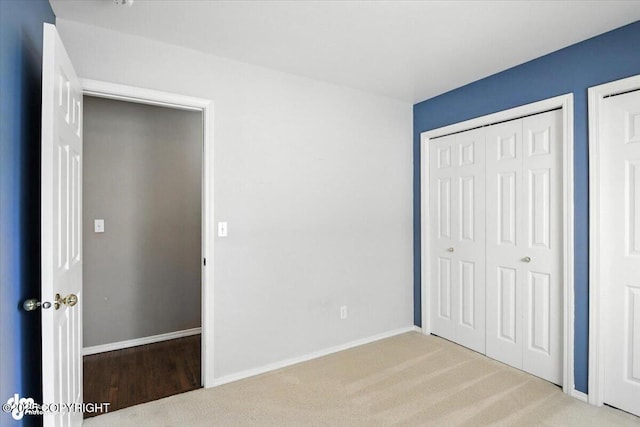 7851 Alpine View Cir, Anchorage, AK 99507 - unfurnished bedroom with baseboards and carpet floors