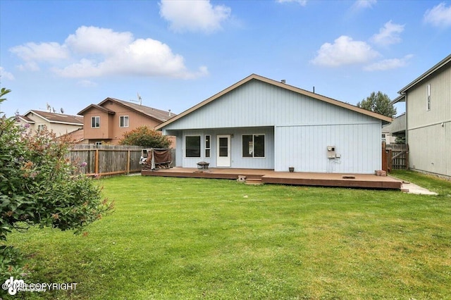 7851 Alpine View Cir, Anchorage, AK 99507 - rear view of property with a fenced backyard and a deck