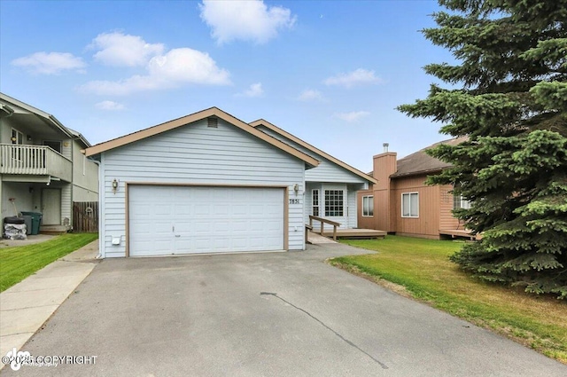 7851 Alpine View Cir, Anchorage, AK 99507 - ranch-style home featuring asphalt driveway, a front lawn, and a garage