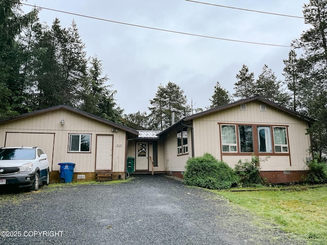 505 Unimak St, Petersburg, AK 99833 - view of front facade featuring crawl space, gravel driveway, entry steps, and a front yard