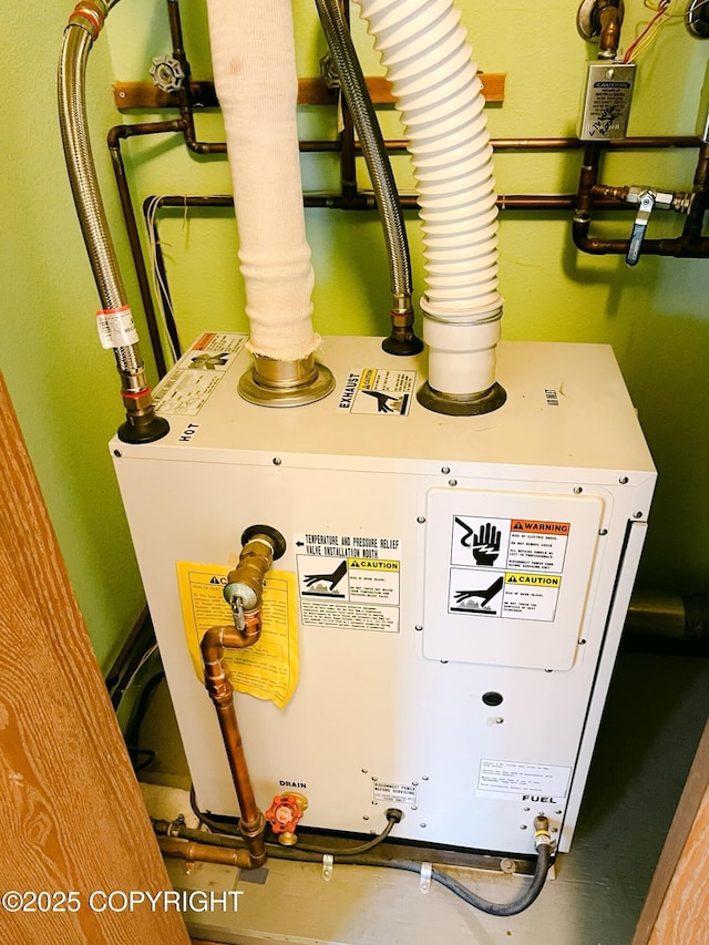 505 Unimak St, Petersburg, AK 99833 - utility room with water heater
