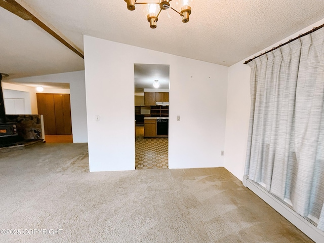 505 Unimak St, Petersburg, AK 99833 - unfurnished living room featuring a chandelier, a wood stove, and carpet flooring