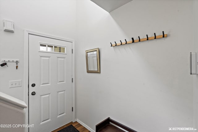 9166 Eagle River Ln, Eagle River, AK 99577 - entryway featuring baseboards and dark wood-style floors