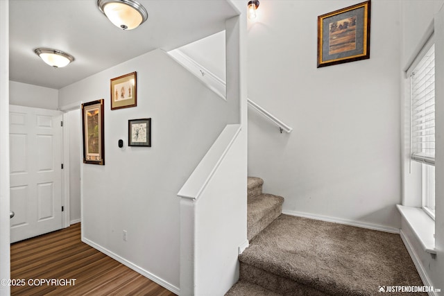 9166 Eagle River Ln, Eagle River, AK 99577 - stairway with baseboards and wood finished floors