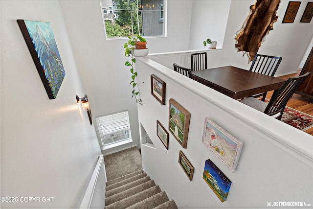 9166 Eagle River Ln, Eagle River, AK 99577 - stairs featuring a towering ceiling and baseboards