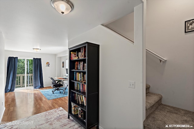 9166 Eagle River Ln, Eagle River, AK 99577 - hall featuring stairway and wood finished floors