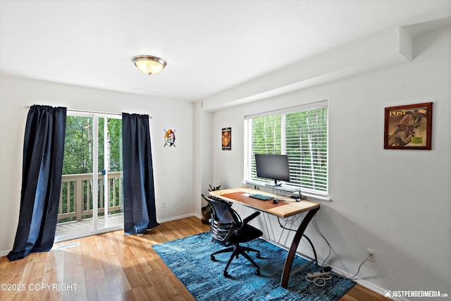 9166 Eagle River Ln, Eagle River, AK 99577 - office space featuring wood finished floors and baseboards