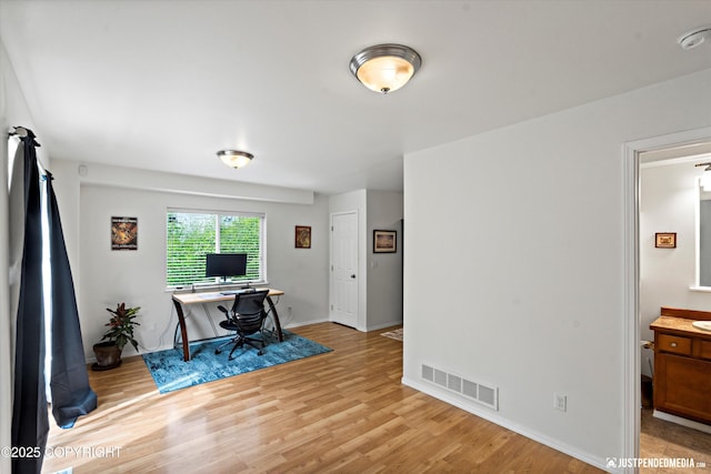 9166 Eagle River Ln, Eagle River, AK 99577 - office featuring light wood finished floors and baseboards