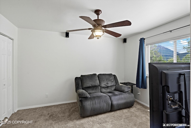 9166 Eagle River Ln, Eagle River, AK 99577 - living area with carpet and ceiling fan