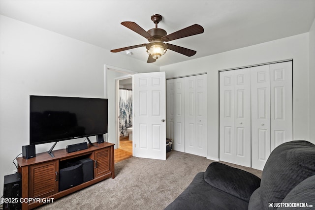 9166 Eagle River Ln, Eagle River, AK 99577 - living area with carpet floors and a ceiling fan