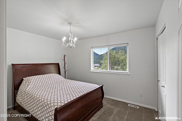 9166 Eagle River Ln, Eagle River, AK 99577 - carpeted bedroom with baseboards and a closet