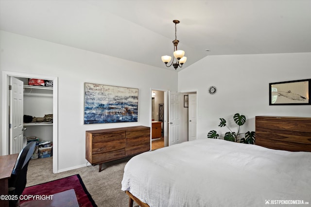 9166 Eagle River Ln, Eagle River, AK 99577 - bedroom featuring carpet floors, vaulted ceiling, a chandelier, a walk in closet, and a closet