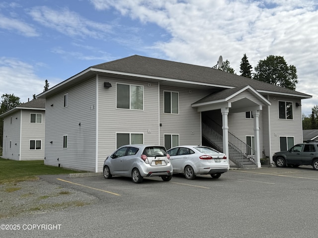 408 Eadies Way, Kenai, AK 99611 - view of front of home with uncovered parking and roof with shingles