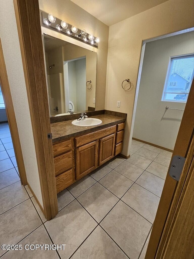 408 Eadies Way, Kenai, AK 99611 - bathroom featuring vanity and tile patterned flooring