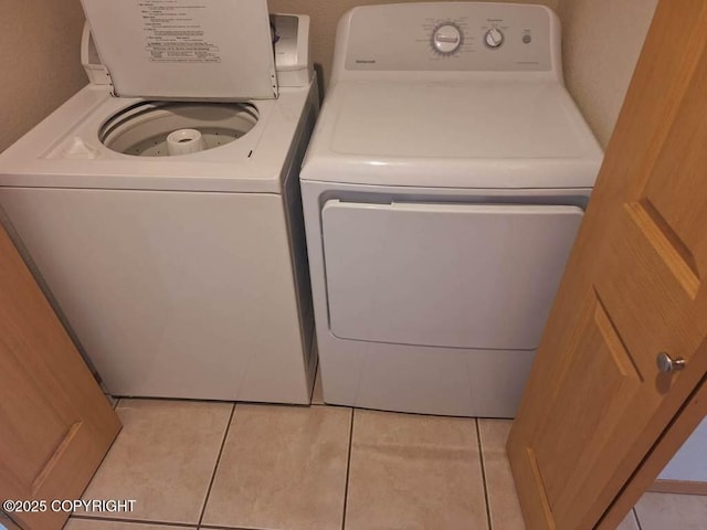408 Eadies Way, Kenai, AK 99611 - laundry area with washing machine and dryer and light tile patterned floors