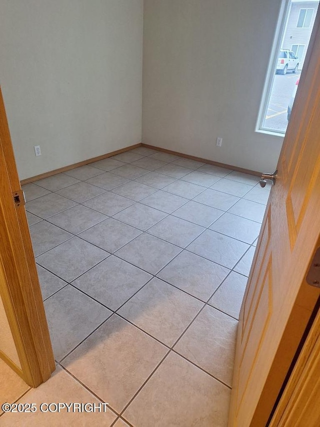 408 Eadies Way, Kenai, AK 99611 - spare room with light tile patterned flooring