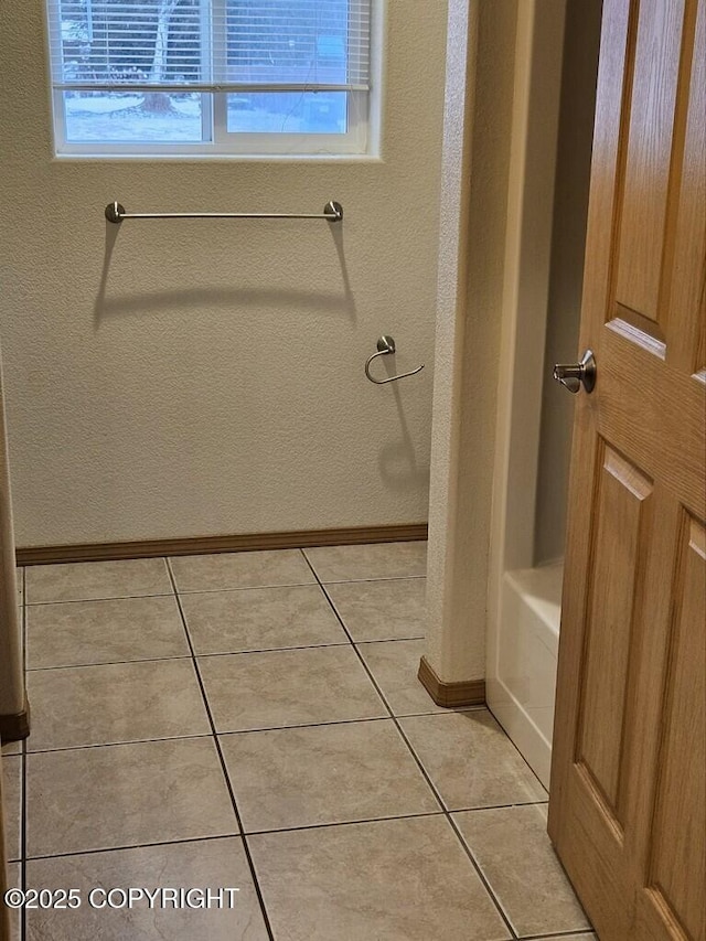 408 Eadies Way, Kenai, AK 99611 - bathroom featuring a tub and tile patterned flooring