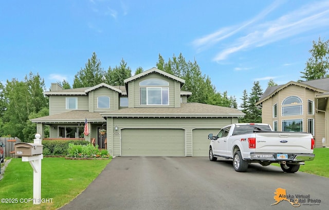 3931 Moonstar Cir, Anchorage, AK 99516 - view of front of home with asphalt driveway, an attached garage, a front lawn, and roof with shingles