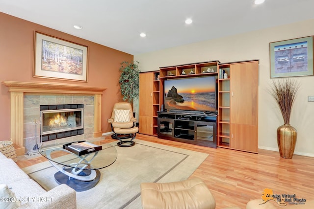3931 Moonstar Cir, Anchorage, AK 99516 - living room with wood finished floors, recessed lighting, and a fireplace