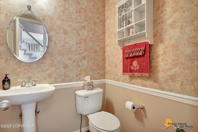 3931 Moonstar Cir, Anchorage, AK 99516 - half bath with wallpapered walls and toilet