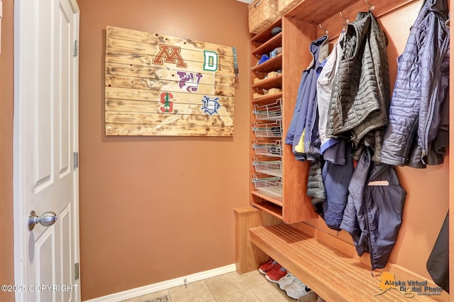 3931 Moonstar Cir, Anchorage, AK 99516 - mudroom featuring tile patterned floors and baseboards