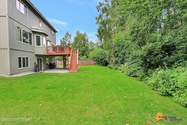 3931 Moonstar Cir, Anchorage, AK 99516 - view of green lawn featuring stairway, a deck, and a patio