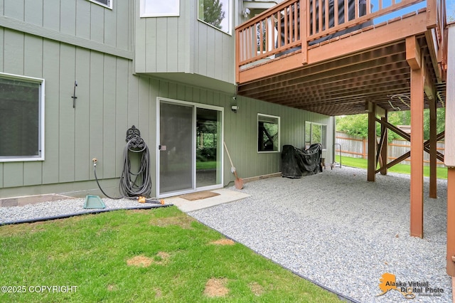 3931 Moonstar Cir, Anchorage, AK 99516 - view of patio / terrace with a deck and a carport