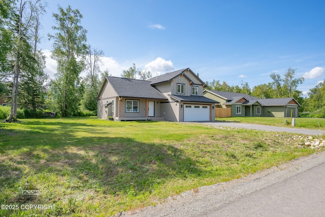 1460 E Esty Dr, Palmer, AK 99645 - view of front of home featuring asphalt driveway, board and batten siding, and a front lawn
