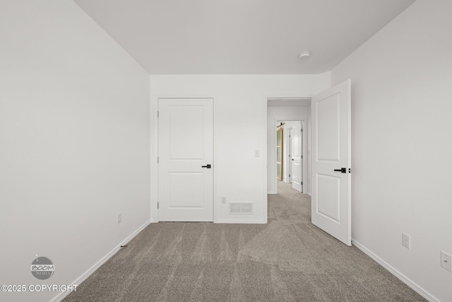 1460 E Esty Dr, Palmer, AK 99645 - unfurnished bedroom with carpet floors and baseboards