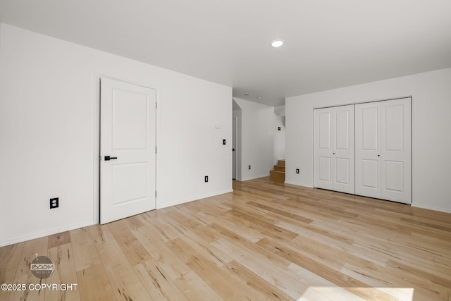 1460 E Esty Dr, Palmer, AK 99645 - unfurnished bedroom with light wood-type flooring and recessed lighting