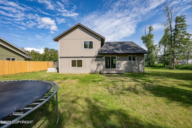 1460 E Esty Dr, Palmer, AK 99645 - back of property featuring a trampoline and roof with shingles