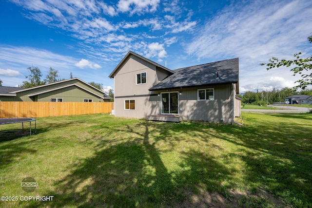 1460 E Esty Dr, Palmer, AK 99645 - back of property featuring a trampoline and roof with shingles