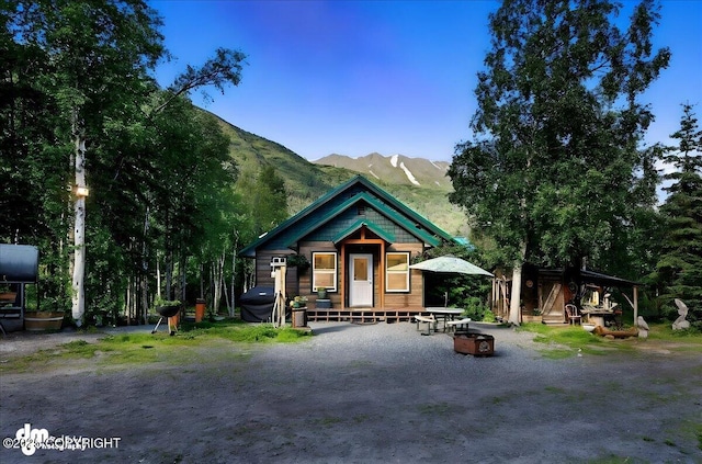 18095 Langille Rd, Cooper Landing, AK 99572 - rear view of house with a mountain view