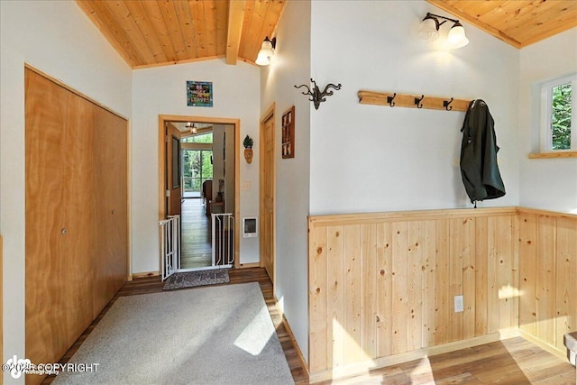 18095 Langille Rd, Cooper Landing, AK 99572 - mudroom with wood ceiling, healthy amount of natural light, wood finished floors, and wood walls