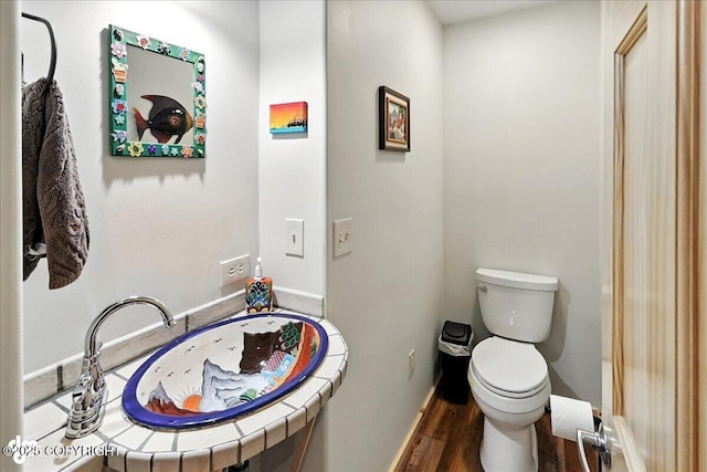 18095 Langille Rd, Cooper Landing, AK 99572 - half bath with toilet and wood finished floors