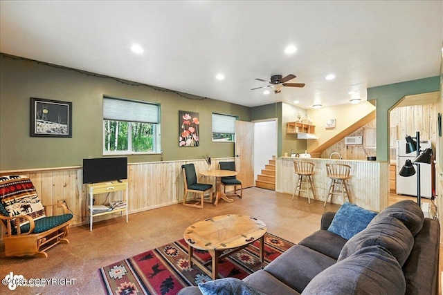 18095 Langille Rd, Cooper Landing, AK 99572 - living room with ceiling fan, a wainscoted wall, carpet floors, recessed lighting, and stairway