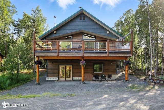 18095 Langille Rd, Cooper Landing, AK 99572 - back of house featuring a wooden deck and a patio
