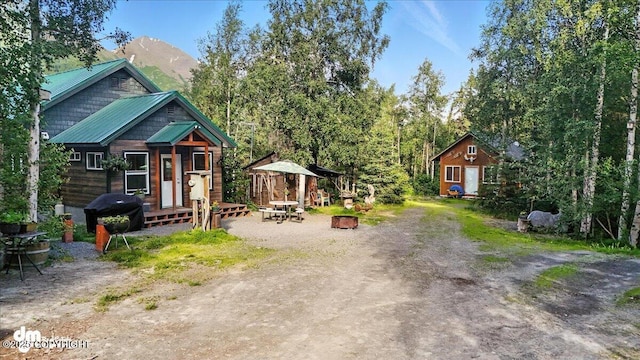 18095 Langille Rd, Cooper Landing, AK 99572 - view of yard with an outdoor structure and a mountain view