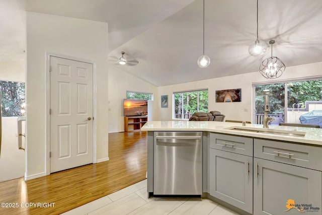 7862 Spruce St Unit 7B, Anchorage, AK 99507 - kitchen with dishwasher, gray cabinets, open floor plan, vaulted ceiling, and light countertops