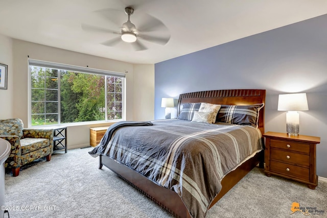 7862 Spruce St Unit 7B, Anchorage, AK 99507 - carpeted bedroom with baseboards and a ceiling fan