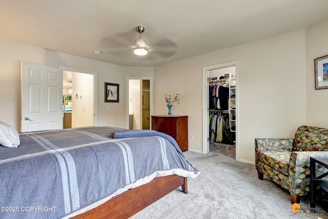 7862 Spruce St Unit 7B, Anchorage, AK 99507 - carpeted bedroom featuring a spacious closet, a closet, a ceiling fan, and connected bathroom