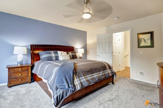 7862 Spruce St Unit 7B, Anchorage, AK 99507 - carpeted bedroom featuring baseboards and ceiling fan