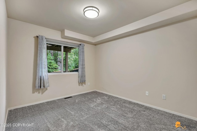 7862 Spruce St Unit 7B, Anchorage, AK 99507 - unfurnished room with carpet flooring and baseboards