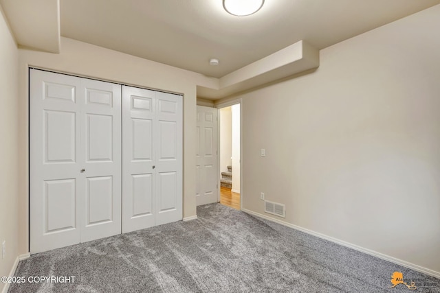 7862 Spruce St Unit 7B, Anchorage, AK 99507 - unfurnished bedroom with carpet and a closet